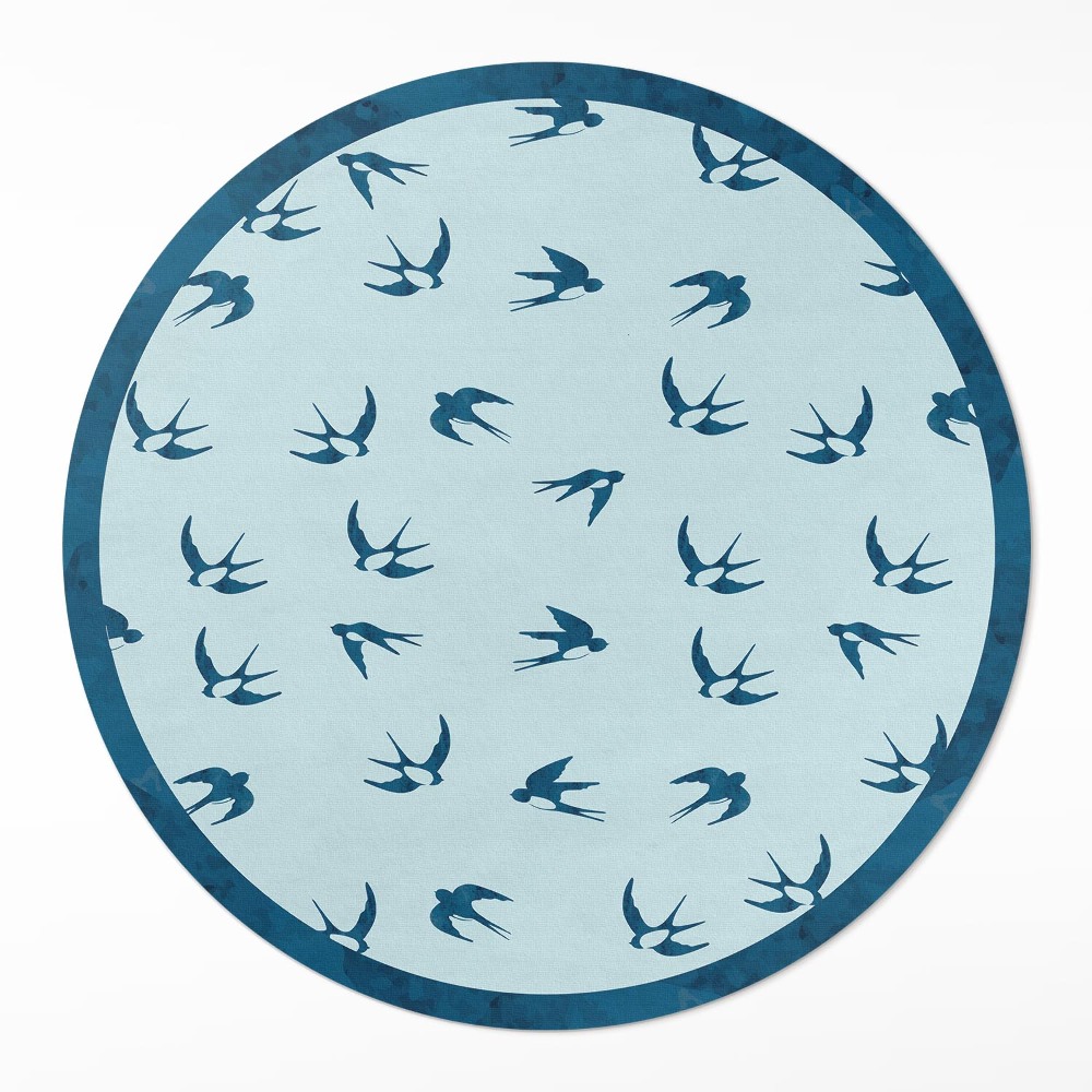 Okrúhly vinylový koberec Malé lístky na modrom pozadí