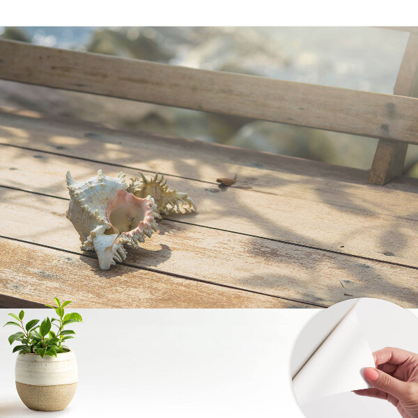 Tapeta Škrupina na drevenej lavičke