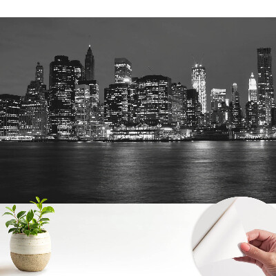 Tapeta do obývačky Panoráma mesta v noci s odrazom vo vode