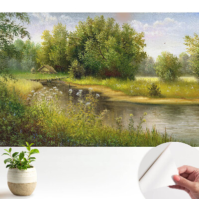 Tapeta na stenu samolepiaca s motívom idylickej krajiny s lesom a vodou