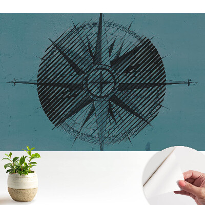 Tapeta s motívom abstraktného kompasu na modrom pozadí