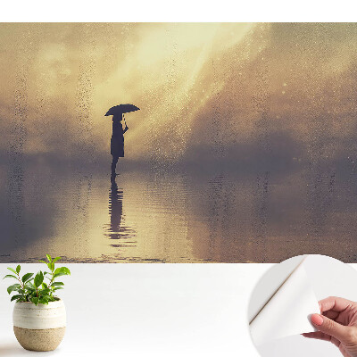 Tapety na stenu samolepiace Postava v daždi, žiara harmónie