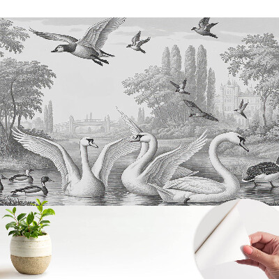 Tapeta na stenu samolepiaca s motívom romantickej krajiny a labutí