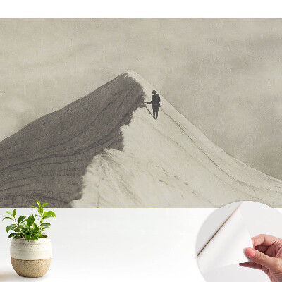 Luxusná tapeta Vrchol hory a osamelý horolezec