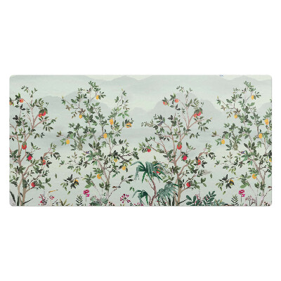 Kancelárska podložka na stôl Exotické vtáky medzi stromami