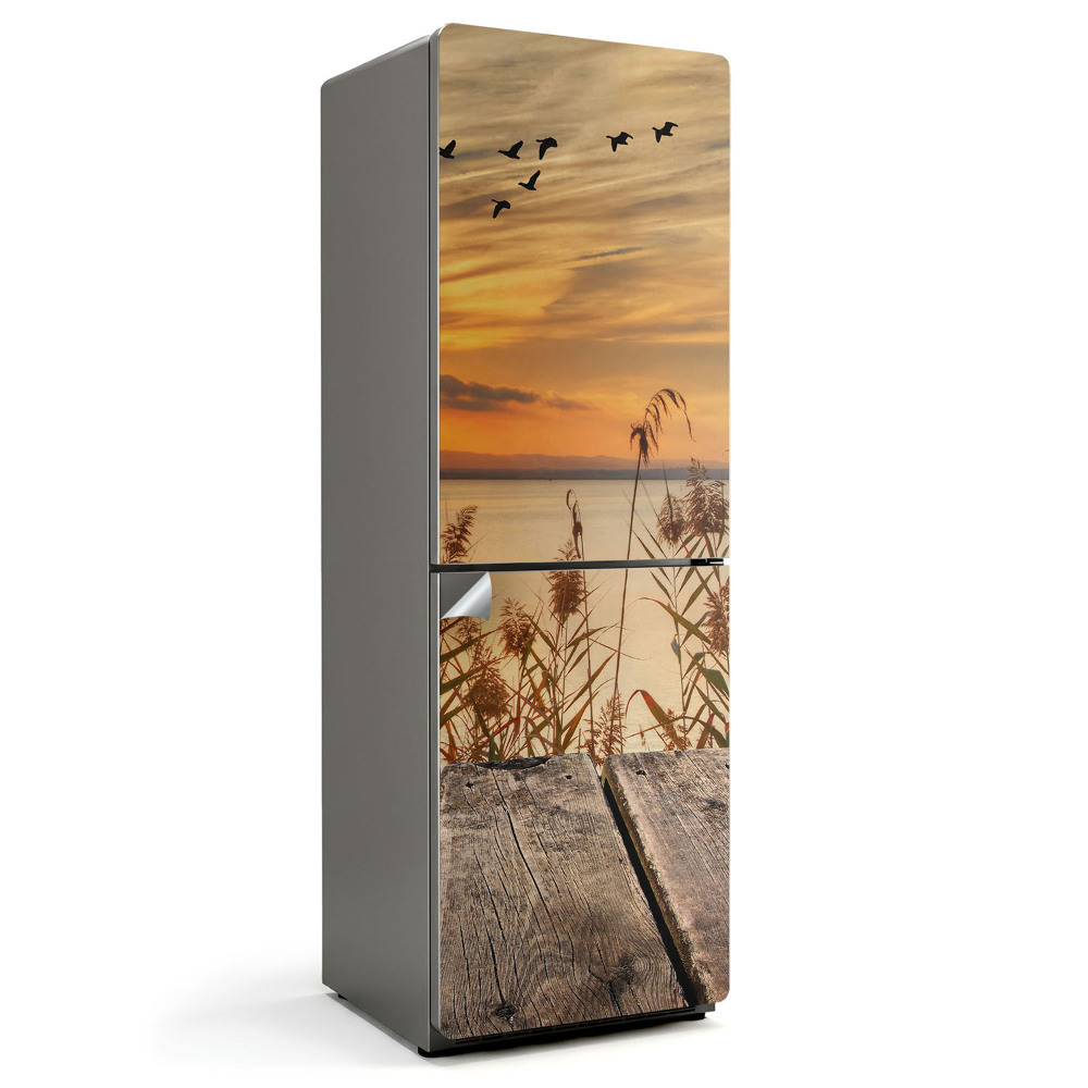 Fototapeta na chladničku Západ slnka nad vodou