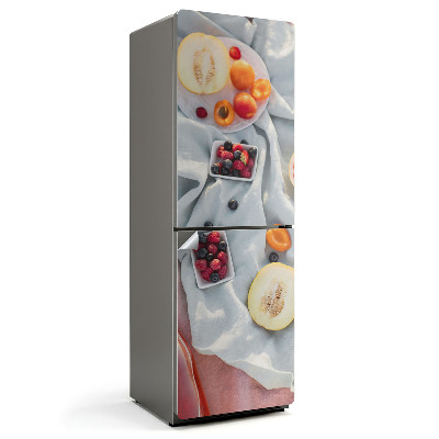 Samolepiaca nálepka na chladničku Čerstvé ovocie na pozadí látky