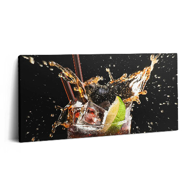 Fotoobraz na plátne 100x50 Špliechajúci nápoj s limetkou a ľadom.