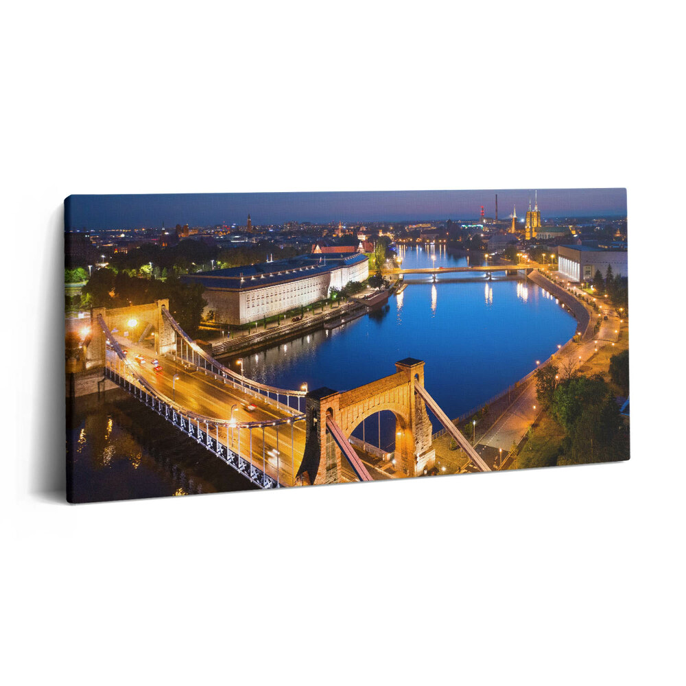 Obraz na plátne 140x70 Nočná panoráma mesta s mostom