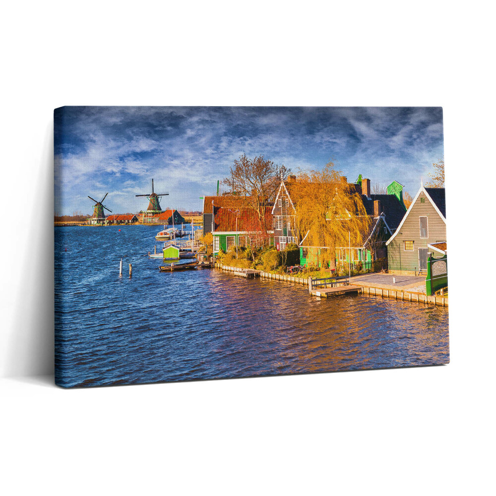 Obraz na plátne 30x20 Veterné mlyny pri rieke a domy