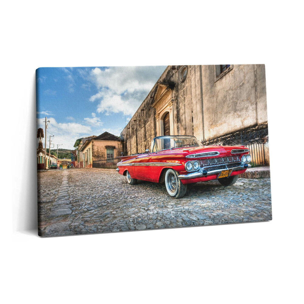 Obraz na plátne 60x40 Staré červené auto v kolumbijskej štvrti