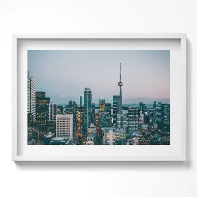 Obraz v ráme Panoráma mesta večer