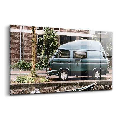 Sklenený obraz Dodávka pri tehlových budovách